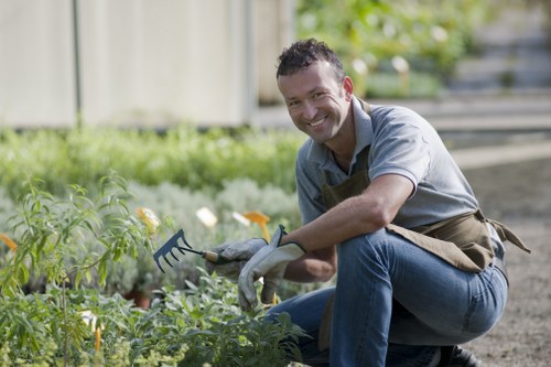 Auditor conducting a site review at a garden project